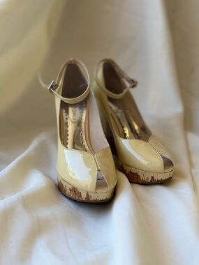BCBGirls Cream Patent Peep-Toe Ankle Strap Wedges